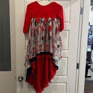 Beautiful designed dress.  Size 8.  No tag showing brand.